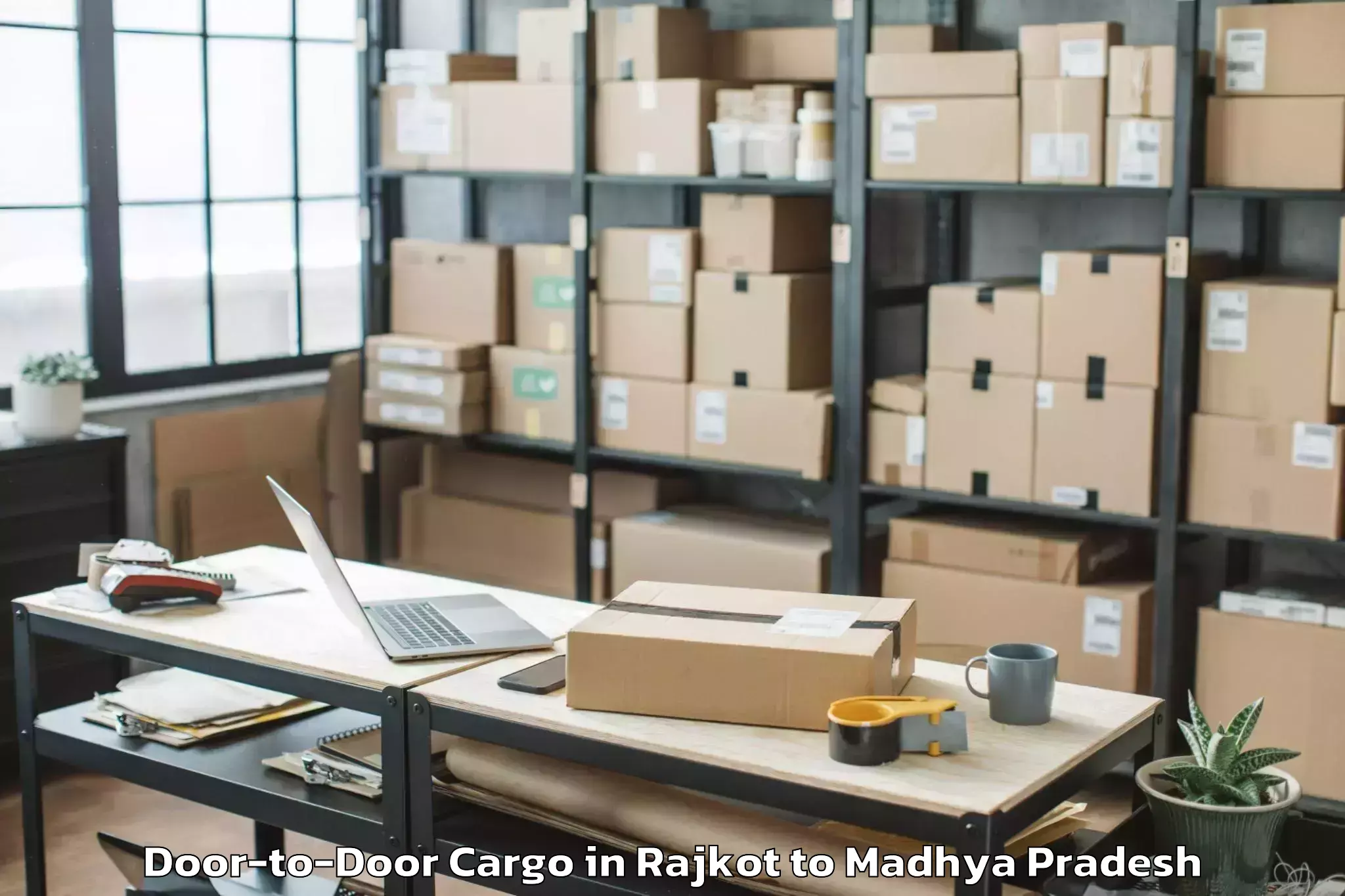 Quality Rajkot to Garhakota Door To Door Cargo